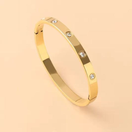 Golden Bracelet with Synthetic/Imitation Stone – Elegance Redefined